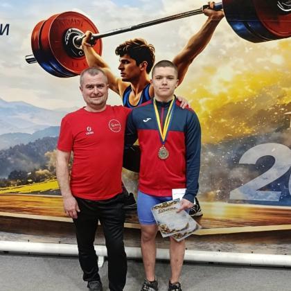 Костюк Артур з тренером Костюком Анатолієм